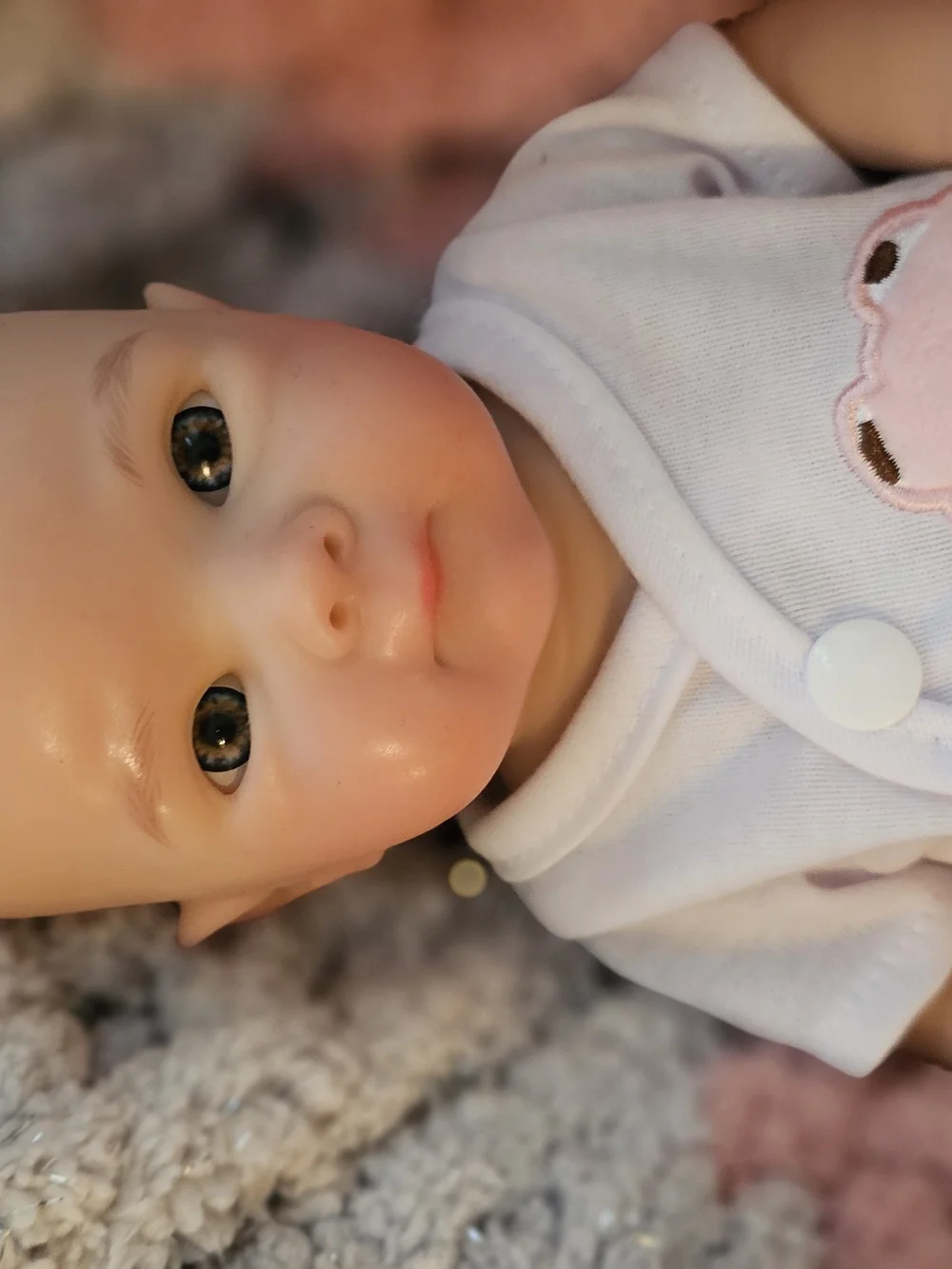 Reborn Pink and White Baby Doll with Frog Outfit